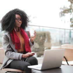 a picture of a woman looking at various way to access capital for her small business